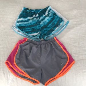 TWO pairs of Nike Dri-fit shorts